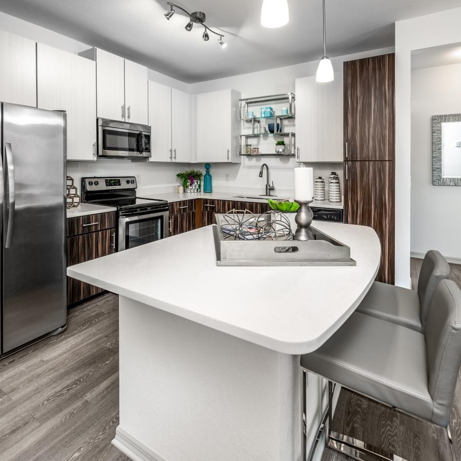 a kitchen with white cabinets